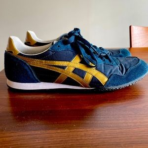 Onitsuka Tiger blue with gold accent. Size 10 mens.